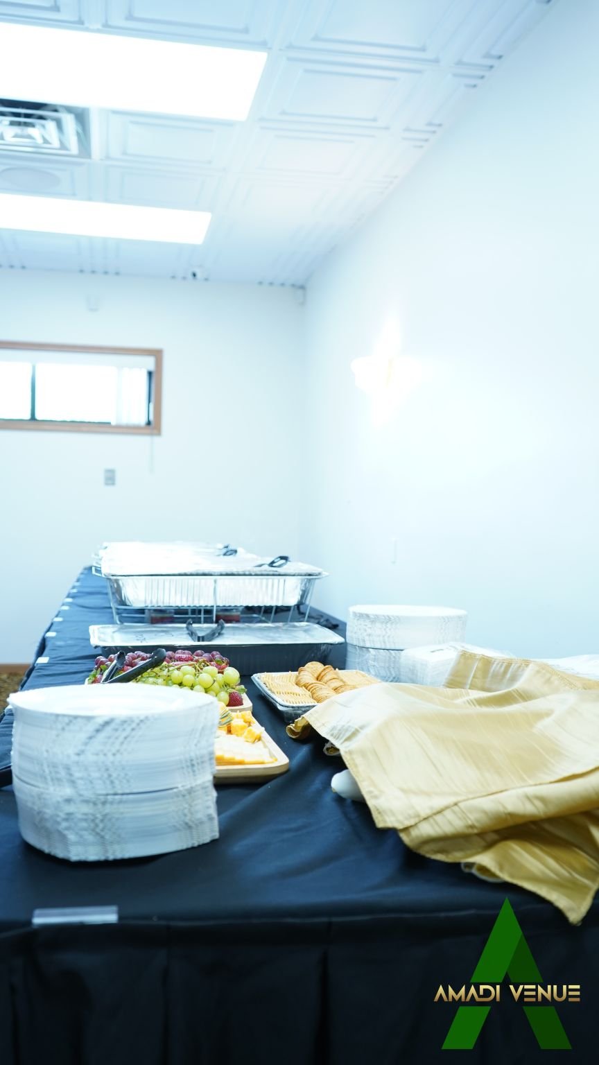 Catering table populated with chaffing dishes.